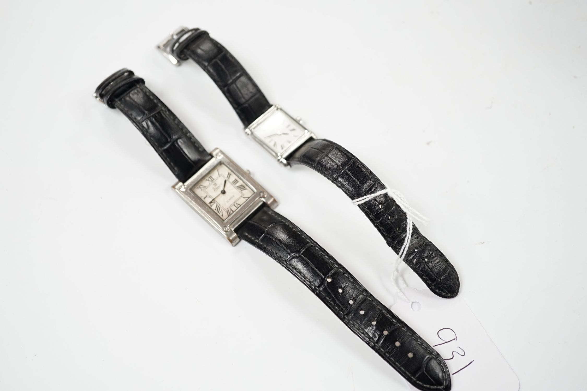 A lady's modern stainless steel Michel Herbelin rectangular dial quartz wrist watch, on a Herbelin leather strap, with original box, together with a stainless steel Diamant quartz wrist watch.
